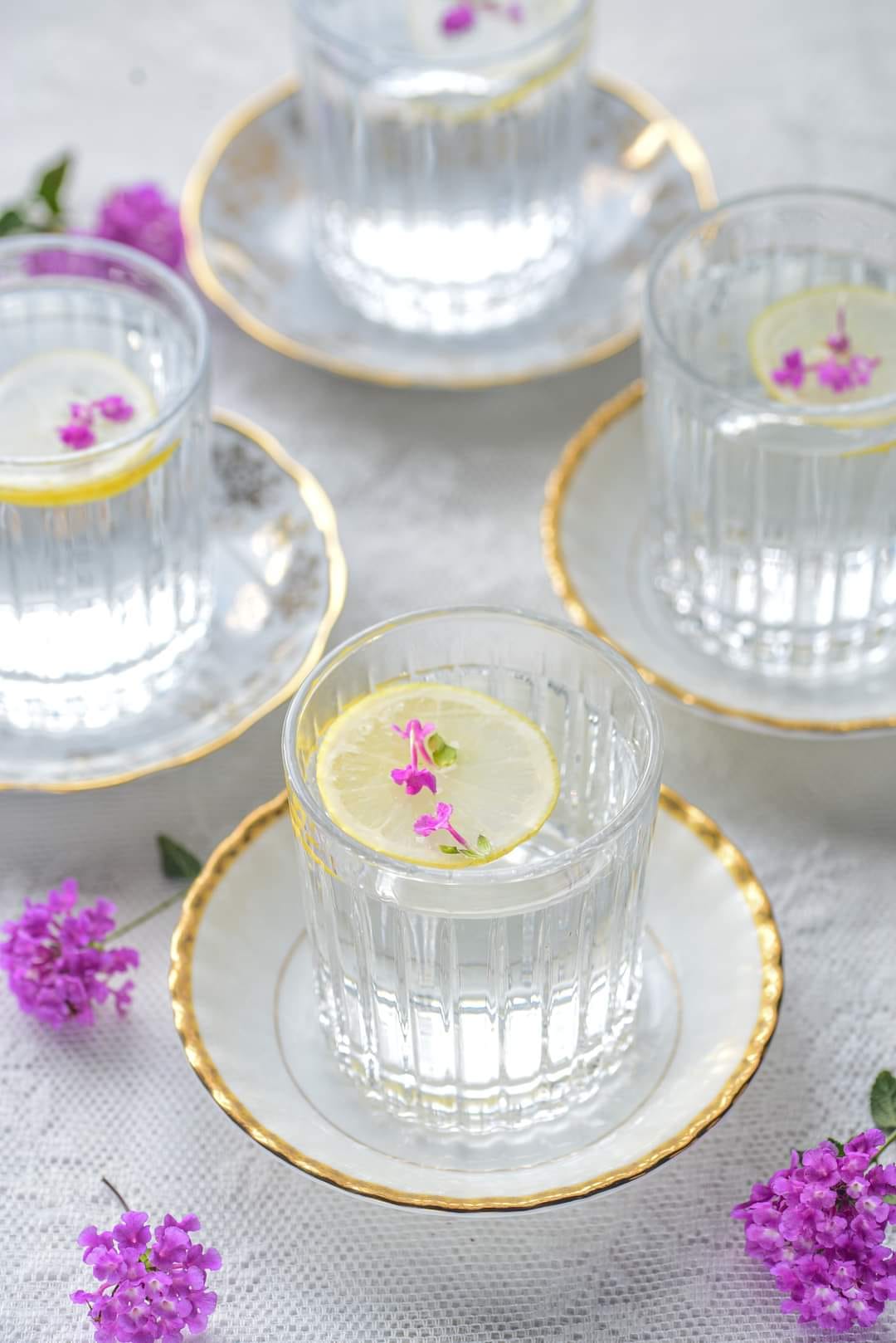 Glasses with water and a slice of lemon